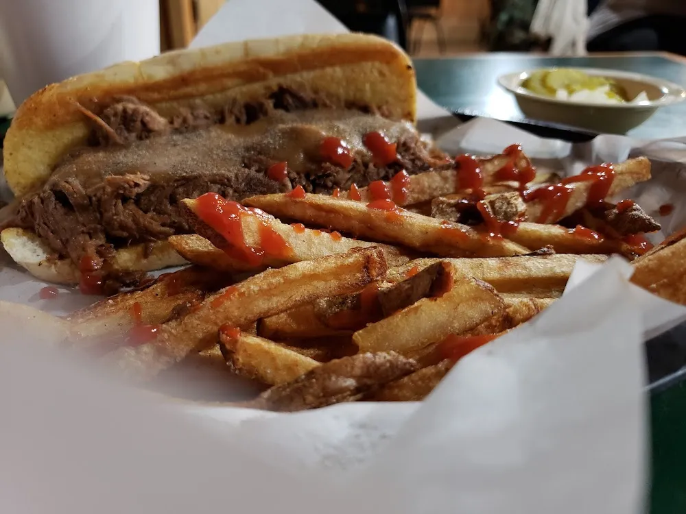 Open Face Rost Beef Sandwich with Brown Gravy and Fries a Must Try